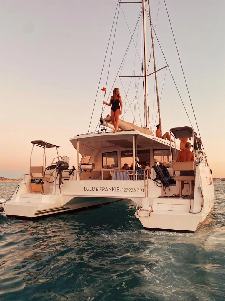 Catamaran view from the back at sunset Lisbon